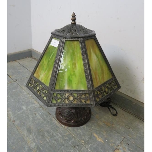 809 - A good quality bronzed table lamp in the Tiffany style, the shade with pierced decoration and sectio... 