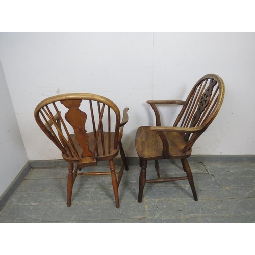 814 - A matched pair of 19th century elm and fruitwood elbow chairs, one a wheelback, the other with shape... 