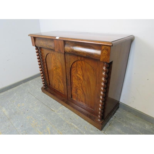 815 - A Victorian flame mahogany crossbanded side cabinet, housing two blind drawers above cupboards with ... 