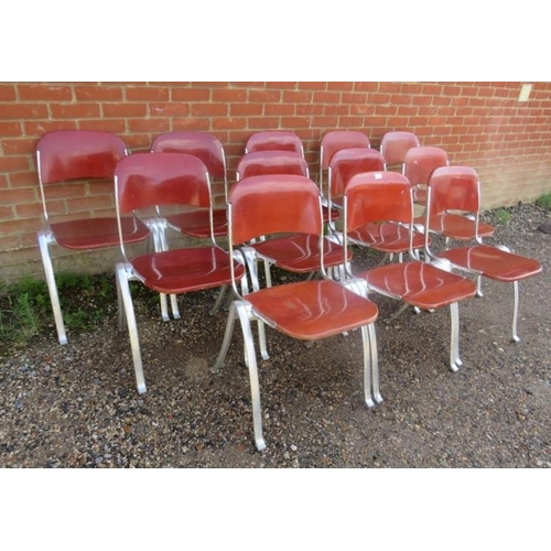 820 - A set of 12 mid-century aluminium and plywood stacking chairs by Joan Casas Ortinez for Indecasa Spa... 