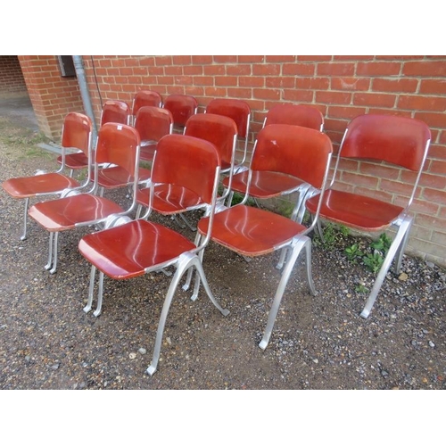 820 - A set of 12 mid-century aluminium and plywood stacking chairs by Joan Casas Ortinez for Indecasa Spa... 