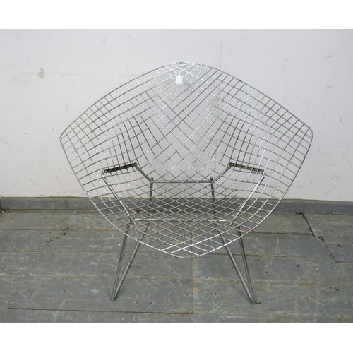 821 - A mid-century chrome ‘diamond’ chair by Harry Bertoia for Knoll, on rail supports. 
H75 x W85 x D72c... 