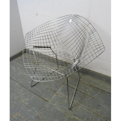 821 - A mid-century chrome ‘diamond’ chair by Harry Bertoia for Knoll, on rail supports. 
H75 x W85 x D72c... 