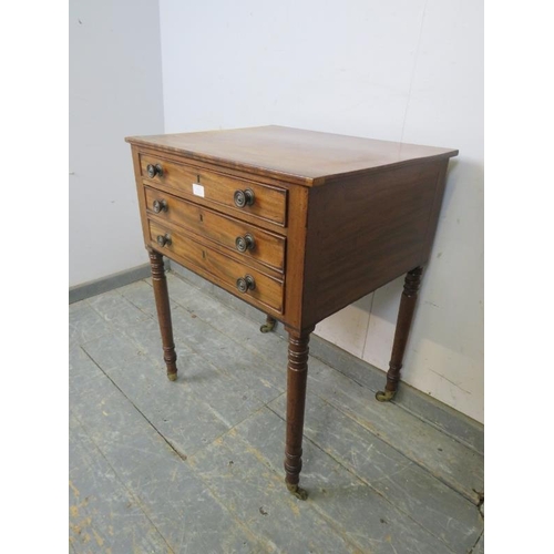 822 - A Georgian mahogany writing table, housing two long cock-beaded drawers with adjustable writing slop... 