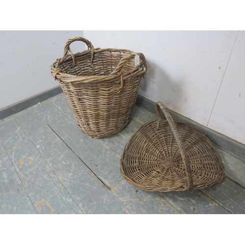 831 - An antique woven willow log basket with twin carry handles. Together with a vintage woven flower bas... 