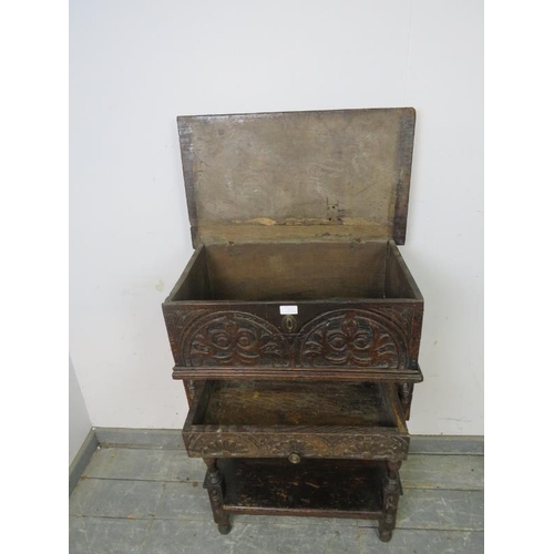 833 - A 17th century oak bible box on stand, having lunette carving to front, the stand with single drawer... 