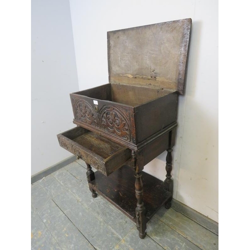 833 - A 17th century oak bible box on stand, having lunette carving to front, the stand with single drawer... 