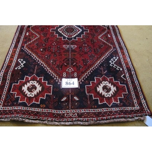 864 - South West Persian Qashqai Runner, three large central motifs on red ground. 275cm x 97cm approx.
Co... 