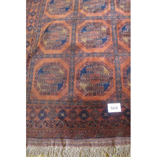 868 - A large early-mid 20th Century Afghan carpet with central block repeat pattern on brown ground. 320c... 