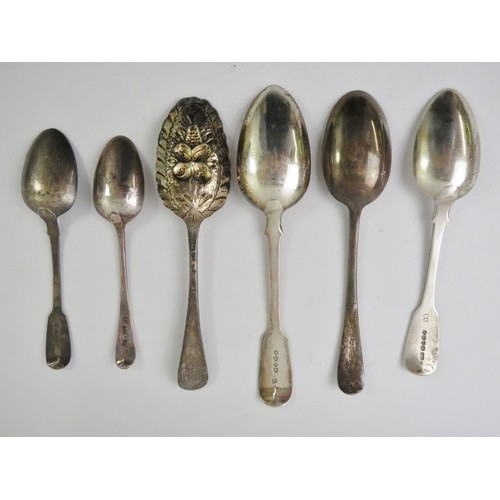 393 - Six mixed antique silver spoons including a George III berry spoon. Various hallmarks and makers. (6... 