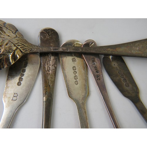 393 - Six mixed antique silver spoons including a George III berry spoon. Various hallmarks and makers. (6... 