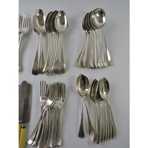 421 - A canteen of mainly silver cutlery consisting of 12 silver table spoons, 12 silver dessert spoons, 1... 