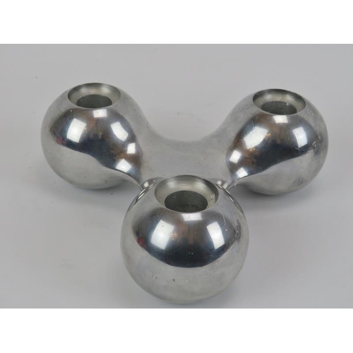 106 - A pair of Danish Georg Jensen triple candle holders of abstract form. (2 items) 19.5 cm width.
Condi... 