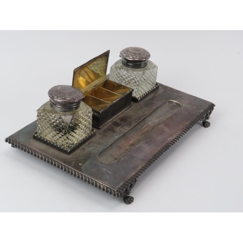 107 - A plated silver desk tidy by Daniel Arter of Birmingham, late 19th/early 20th century. With two glas... 