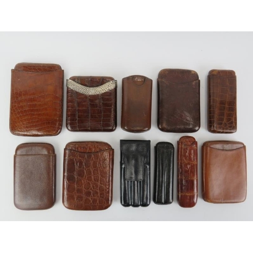 111 - Eleven vintage and antique leather cigar cases. One with sterling silver mount. (11 items) 16.8 cm l... 