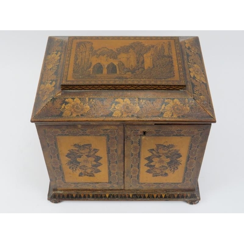 123 - A Tunbridge Ware ornately parquetry inlaid tabletop jewellery cabinet, 19th century. With hinged fro... 