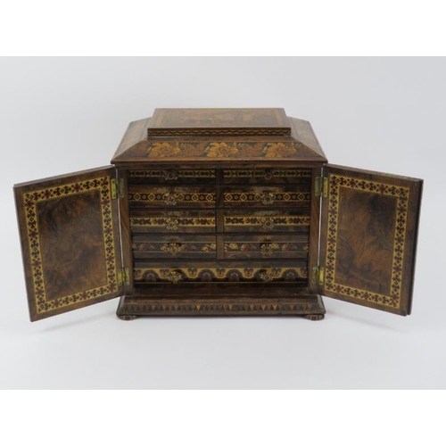 123 - A Tunbridge Ware ornately parquetry inlaid tabletop jewellery cabinet, 19th century. With hinged fro... 