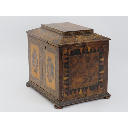 123 - A Tunbridge Ware ornately parquetry inlaid tabletop jewellery cabinet, 19th century. With hinged fro... 