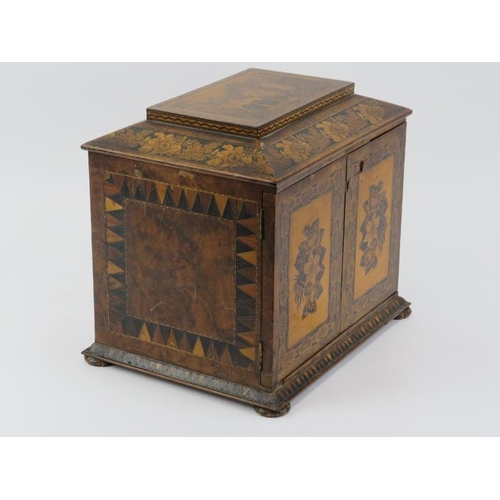 123 - A Tunbridge Ware ornately parquetry inlaid tabletop jewellery cabinet, 19th century. With hinged fro... 