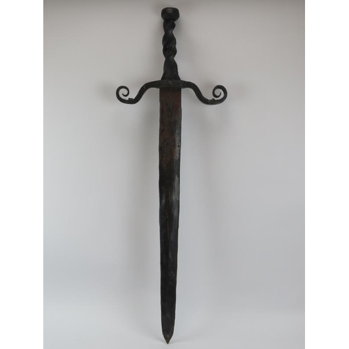 128 - A large wrought iron and steel Medieval style sword, 20th century. 99 cm length.
Condition report: S... 