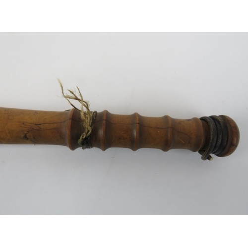 130 - A turned fruitwood truncheon, 19th century. 41.3 cm length. 
Condition report: Handle with splits an... 