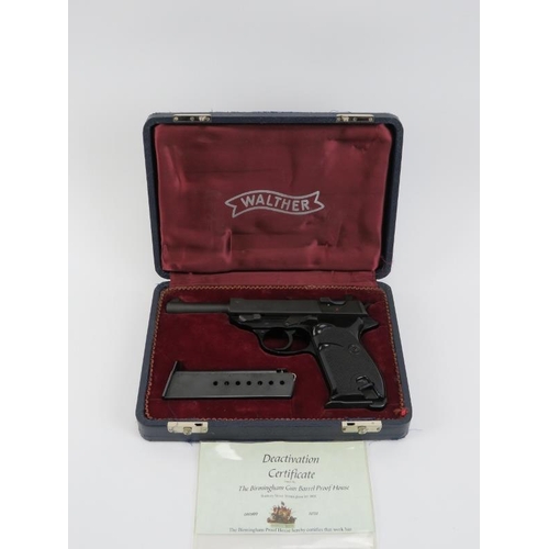 142 - A Walther P38 deactivated 9mm semi automatic pistol. With a spare clip and housed in a presentation ... 