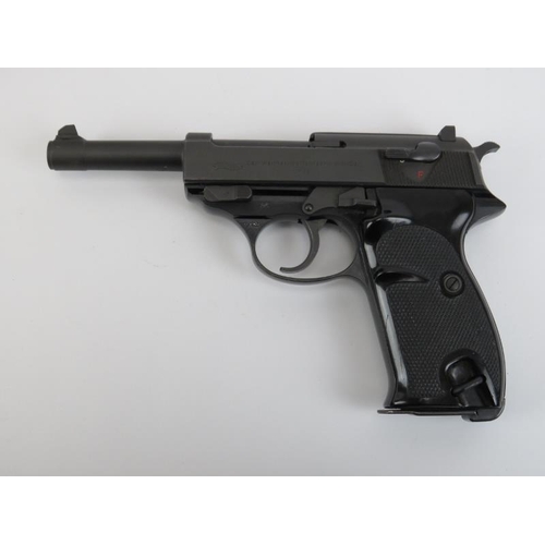 142 - A Walther P38 deactivated 9mm semi automatic pistol. With a spare clip and housed in a presentation ... 