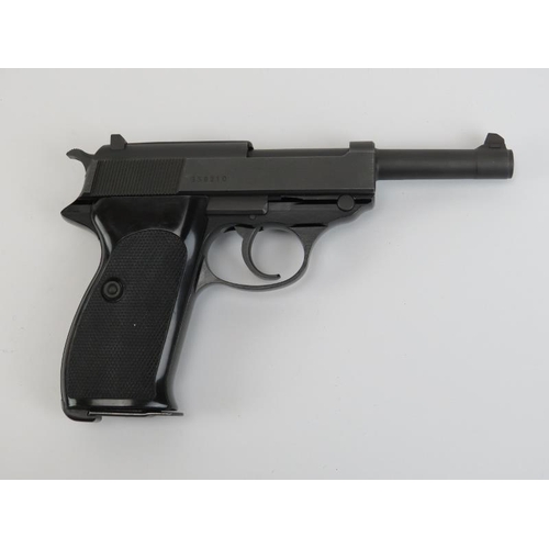 142 - A Walther P38 deactivated 9mm semi automatic pistol. With a spare clip and housed in a presentation ... 