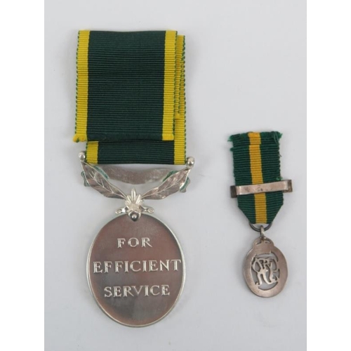 149 - A George VI Efficiency ‘Territorial’ medal and dress medal. Awarded to 5672085 Sapper J. Goodchild R... 