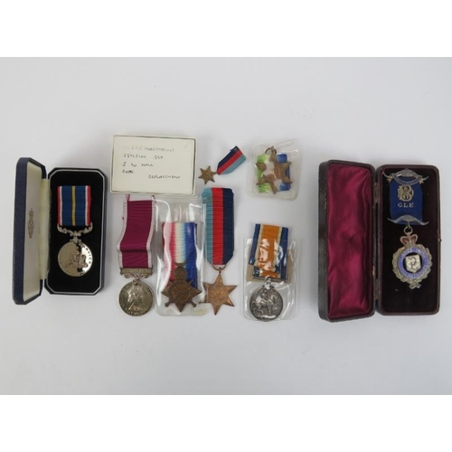 164 - A group of unrelated WWI, WWII medals, National service medal and a silver Buffalo Lodge medal. (8 i... 