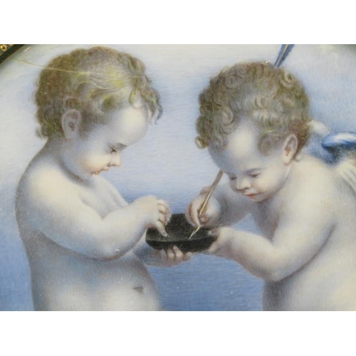 168 - A miniature oil painting of a cherub and putti, 19th century. Displayed in a French brass frame. 11 ... 