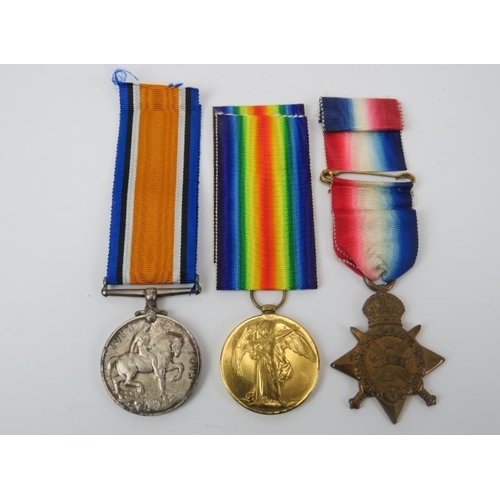 17 - Militaria: A group of three WWI British military medals. Awarded to ‘11459 PTE G. BURNETT. GORDONS.’... 