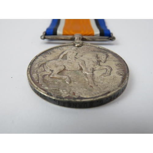 17 - Militaria: A group of three WWI British military medals. Awarded to ‘11459 PTE G. BURNETT. GORDONS.’... 