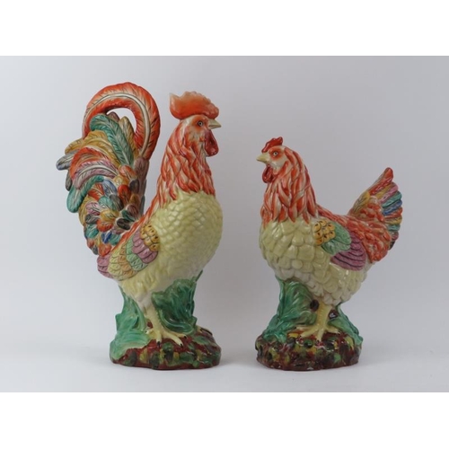 174 - A large vintage Italian hand painted majolica ceramic rooster and hen, 20th century. (2 items) 38.5 ... 