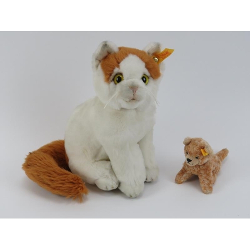 176 - Two Steiff cats. Comprising a Steiff Niki Turkish van cat (099465) and a Katze Kitty cat (112027). B... 