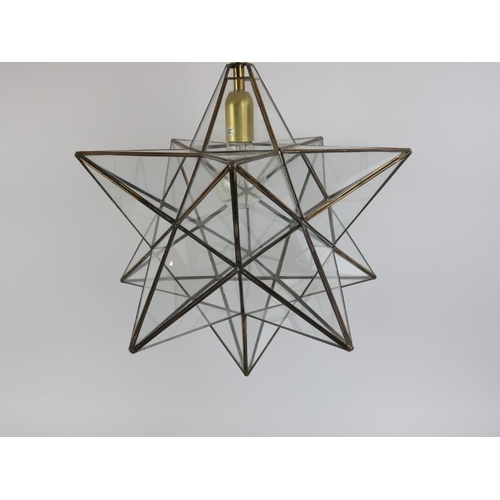 196 - A vintage glass and metal ten pointed star hall lantern. 43 cm approximate height.
Condition report:... 