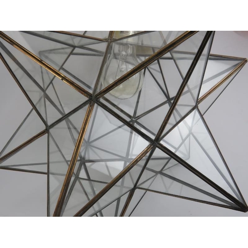 196 - A vintage glass and metal ten pointed star hall lantern. 43 cm approximate height.
Condition report:... 