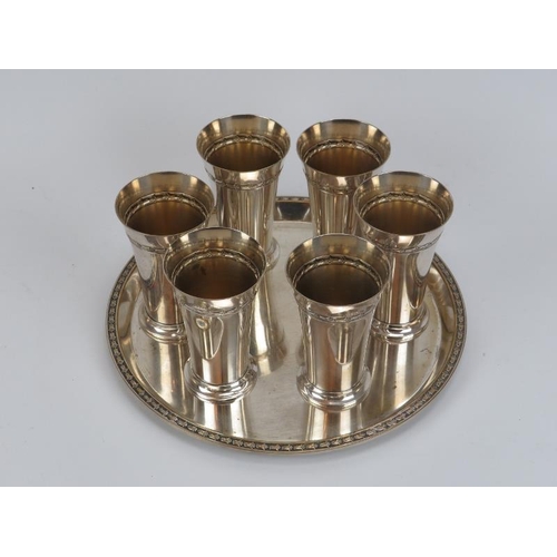 202 - A WMF silver plated toasting drinks set. Comprising six drinking glasses and a matching serving tray... 