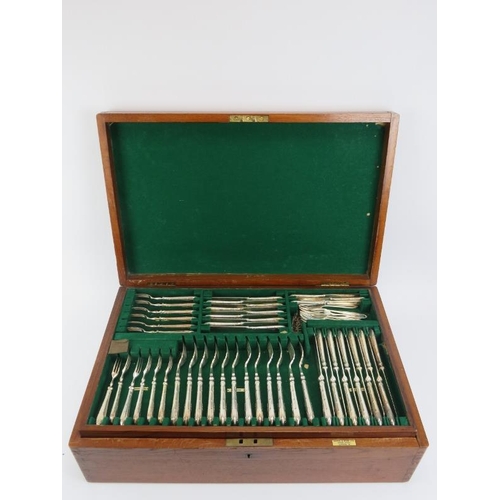 204 - A Mappin & Webb silver plated flatware cutlery canteen, early 20th century. The hinged cover opening... 