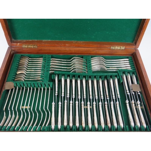 204 - A Mappin & Webb silver plated flatware cutlery canteen, early 20th century. The hinged cover opening... 