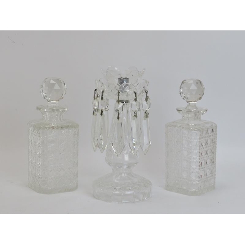 242 - A pair of hobnail cut glass decanters with stoppers and a glass lustre. (3 items) Decanters: 22 cm h... 