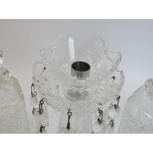 242 - A pair of hobnail cut glass decanters with stoppers and a glass lustre. (3 items) Decanters: 22 cm h... 