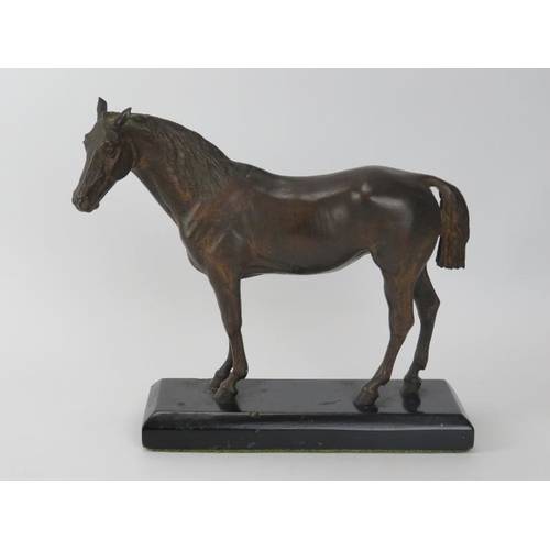 243 - An Austrian bronze figure of a horse, late 19th/early 20th century. Mounted on an ebonised base. Hor... 