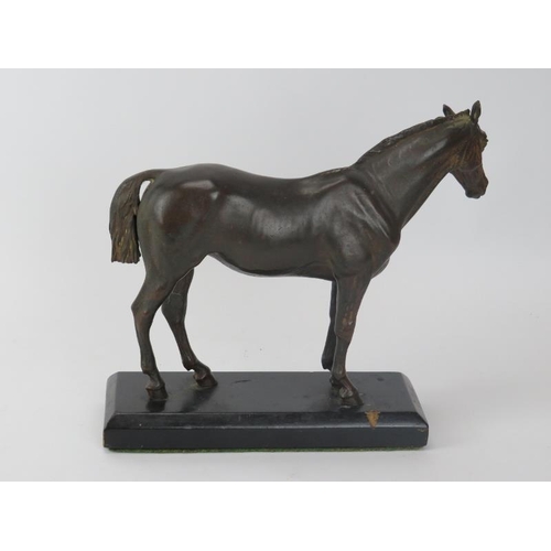 243 - An Austrian bronze figure of a horse, late 19th/early 20th century. Mounted on an ebonised base. Hor... 