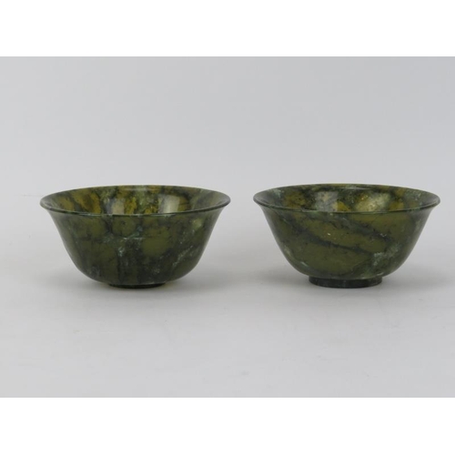 246 - A pair of Chinese green turned hardstone bowls, 20th century. (2 items) 9.9 cm diameter.
Condition r... 