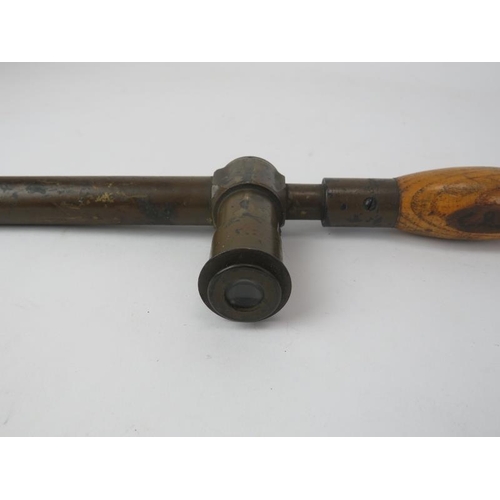 250 - A WWI brass trench periscope by R & J Beck Ltd. With a turned oak handle. Marked ‘R & J Beck Ltd 191... 