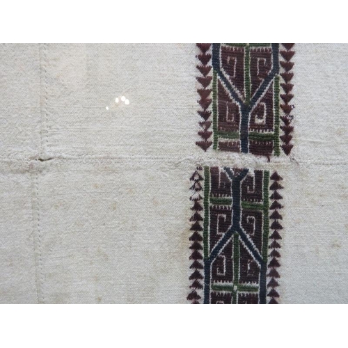 253 - A large woven textile with geometric decoration, possibly North Africa. Framed and glazed. 76 cm x 4... 