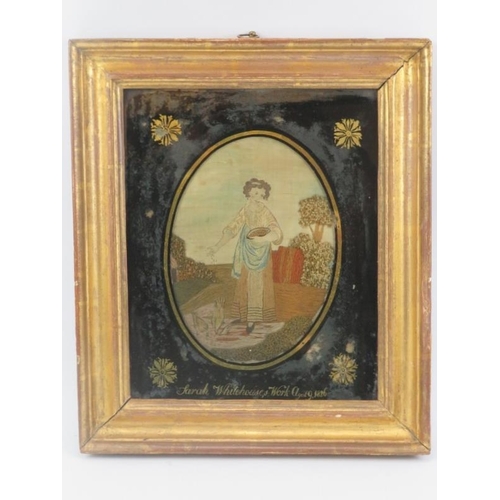 26 - A Georgian figural silkwork panel, dated 1826. Of oval form, depicting a female figure feeding chick... 