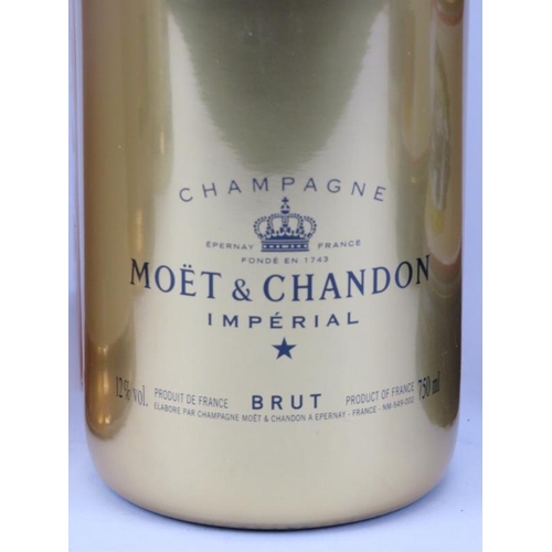 300 - A bottle of Moet & Chandon champagne and six empty Scotch Whisky bottles. 750ml bottle of champagne ... 