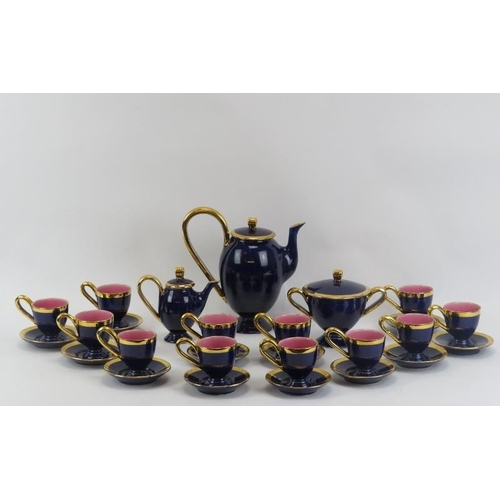 52 - A French Monica Ceram of Vallauris set for twelve gilt blue ceramic coffee set. Comprising a coffee ... 